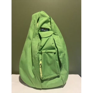 solid green Kavu sling backpack/ purse